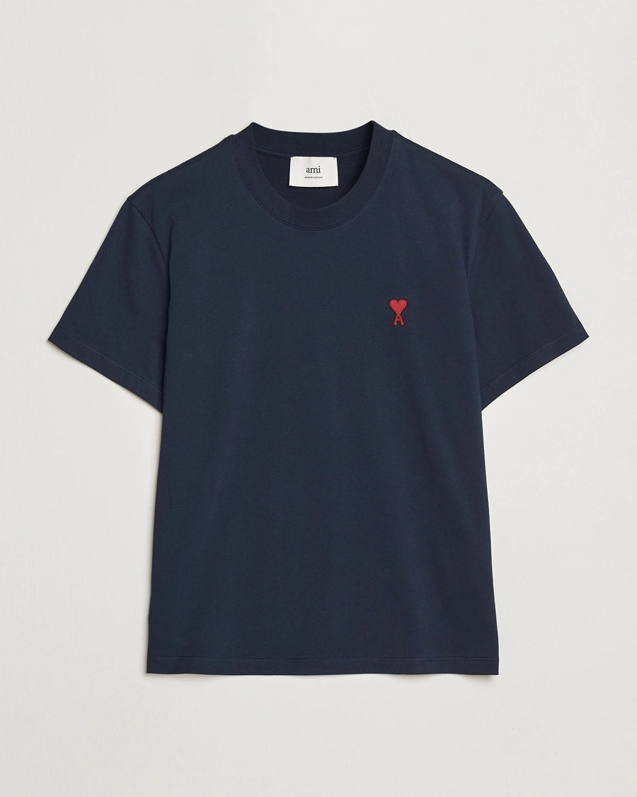 AMI Paris Heart Logo Men Tshirt in navy blue with red heart logo on chest.