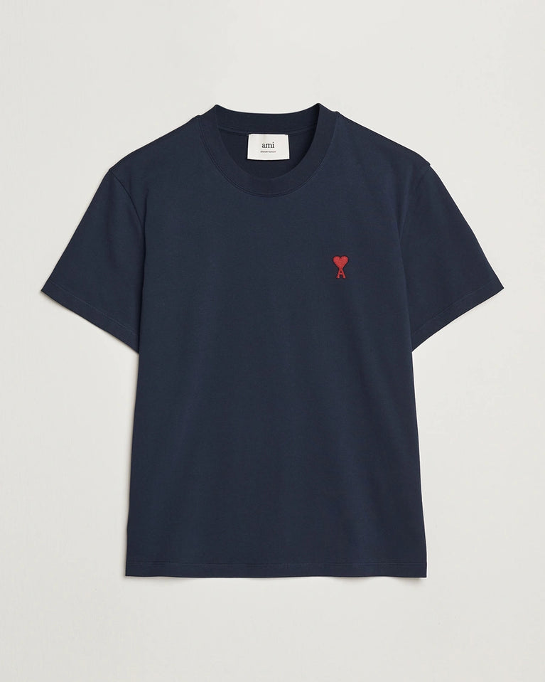 AMI Paris Heart Logo Men Tshirt in navy blue with red heart logo on chest.