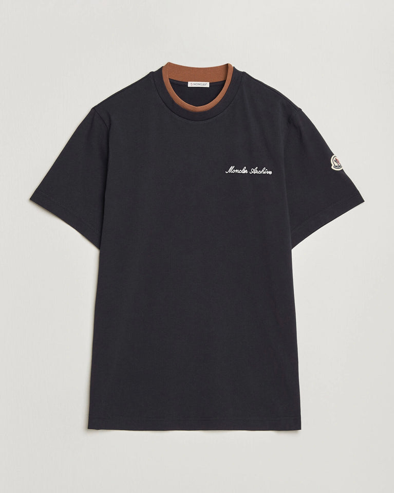 Moncler Men Signature Logo Tshirt displayed in Navy, featuring logo detail and contrasting neckline.