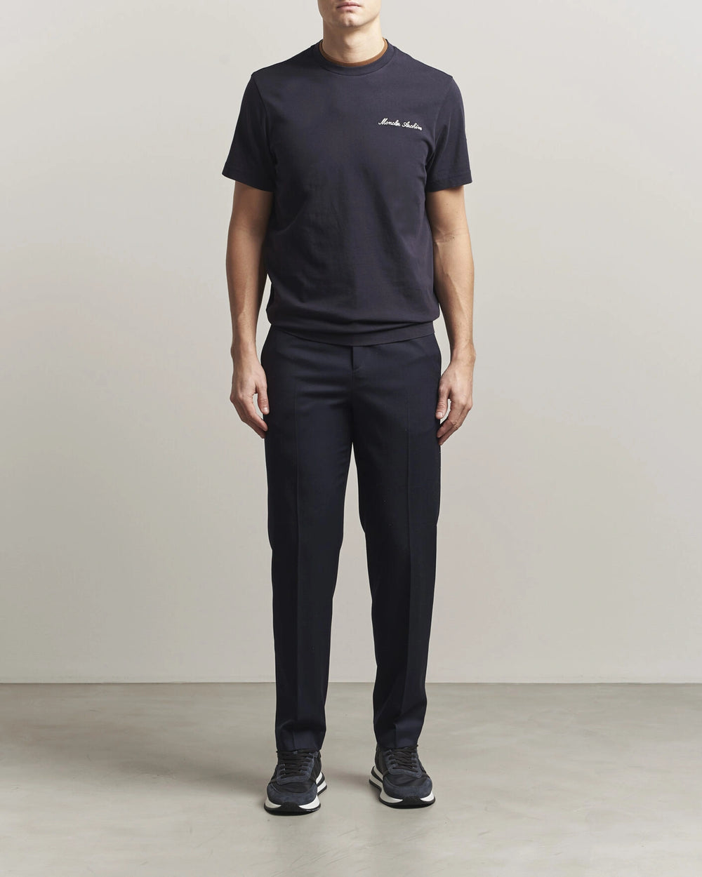 Moncler Men Signature Logo Tshirt displayed in Navy, featuring logo detail and contrasting neckline.