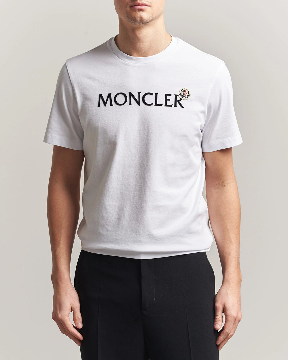 Moncler Men Lettering Logo Tshirt in white featuring a bold logo