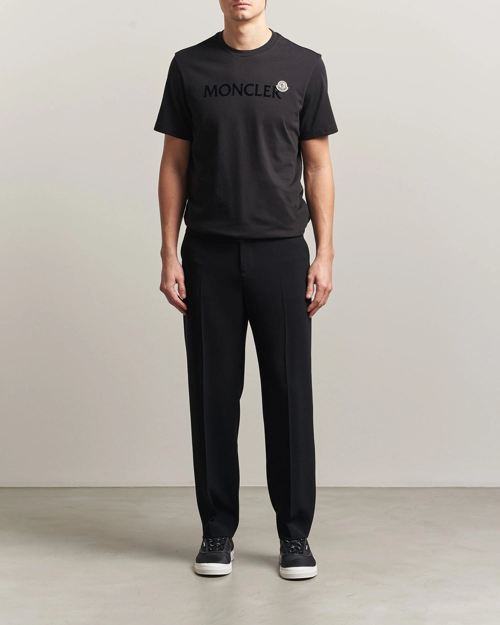 Moncler Men Lettering Logo Tshirt in black featuring a bold logo