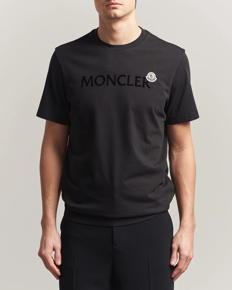 Moncler Men Lettering Logo Tshirt in black featuring a bold logo