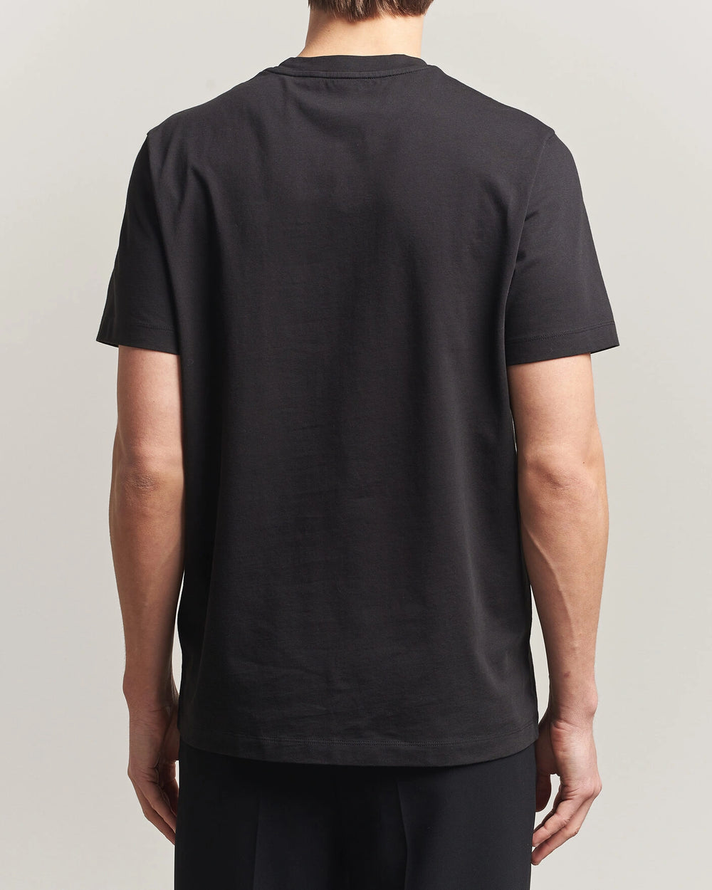 Moncler Men Lettering Logo Tshirt in black featuring a bold logo