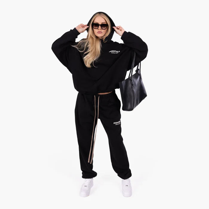 FEAR OF GOD ESSENTIALS Sweatpant in gray, featuring a comfortable fit and minimalist design for stylish loungewear. FEAR OF GOD ESSENTIALS Sweatpant in gray, featuring a comfortable fit and minimalist design for stylish loungewear.