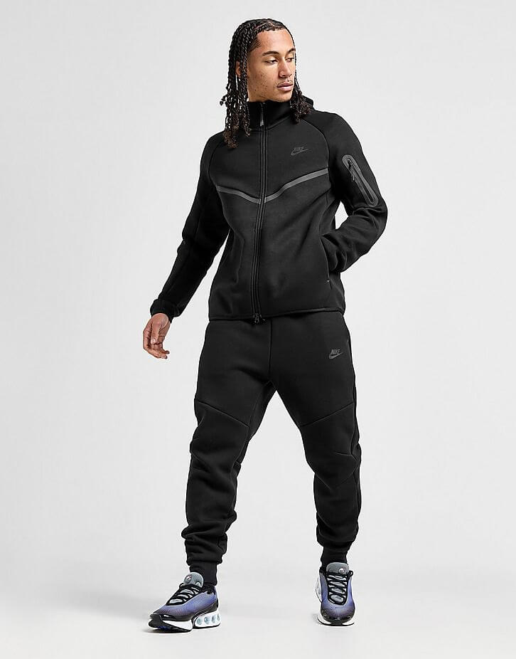 Nike Sportswear Tech Fleece Hoodie & Joggers Set Black worn by model, showcasing sleek athletic style and comfort.