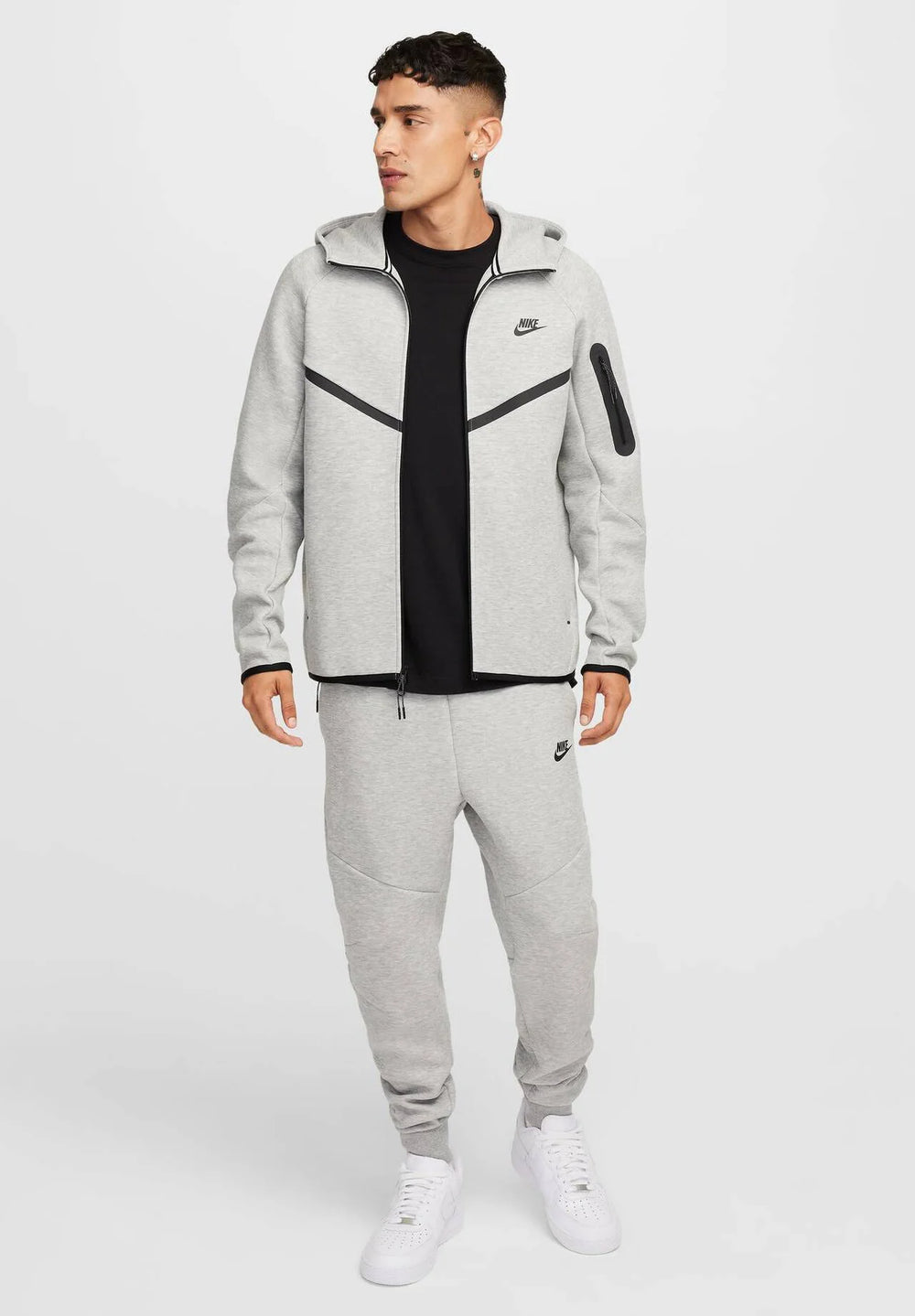 Shop Nike Sportswear Tech Fleece Hoodie & Joggers Set Grey for warmth, comfort, and style. Perfect for everyday wear with a sleek modern fit.