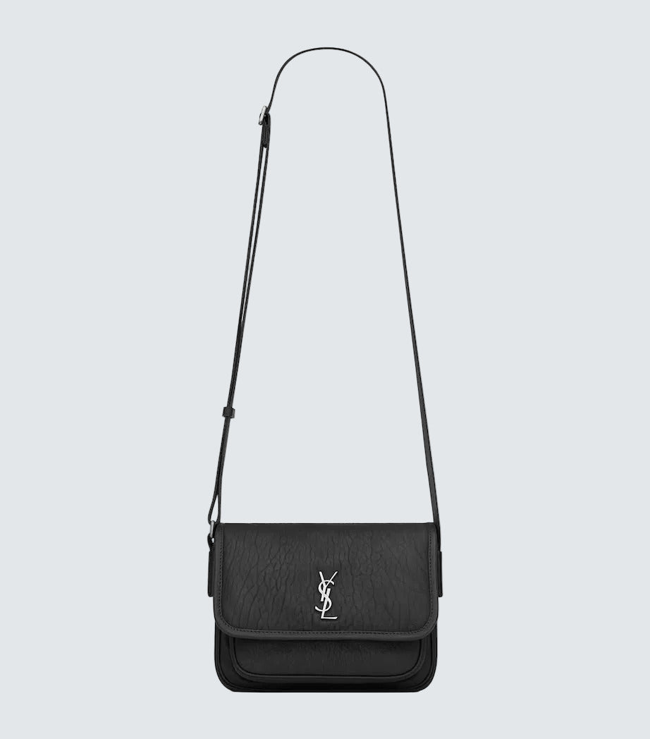 Saint Laurent Niki Small Leather Messenger Bag featuring elegant design and adjustable strap.