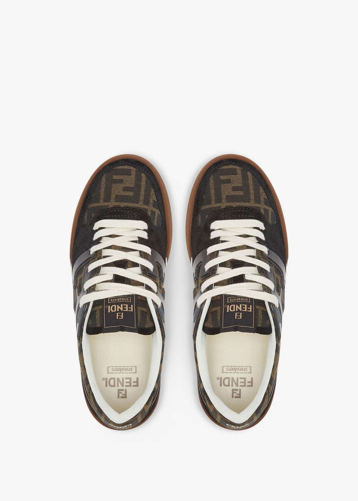 Fendi Sneaker Match Leather Black showcasing stylish design with patterned upper and brown sole.