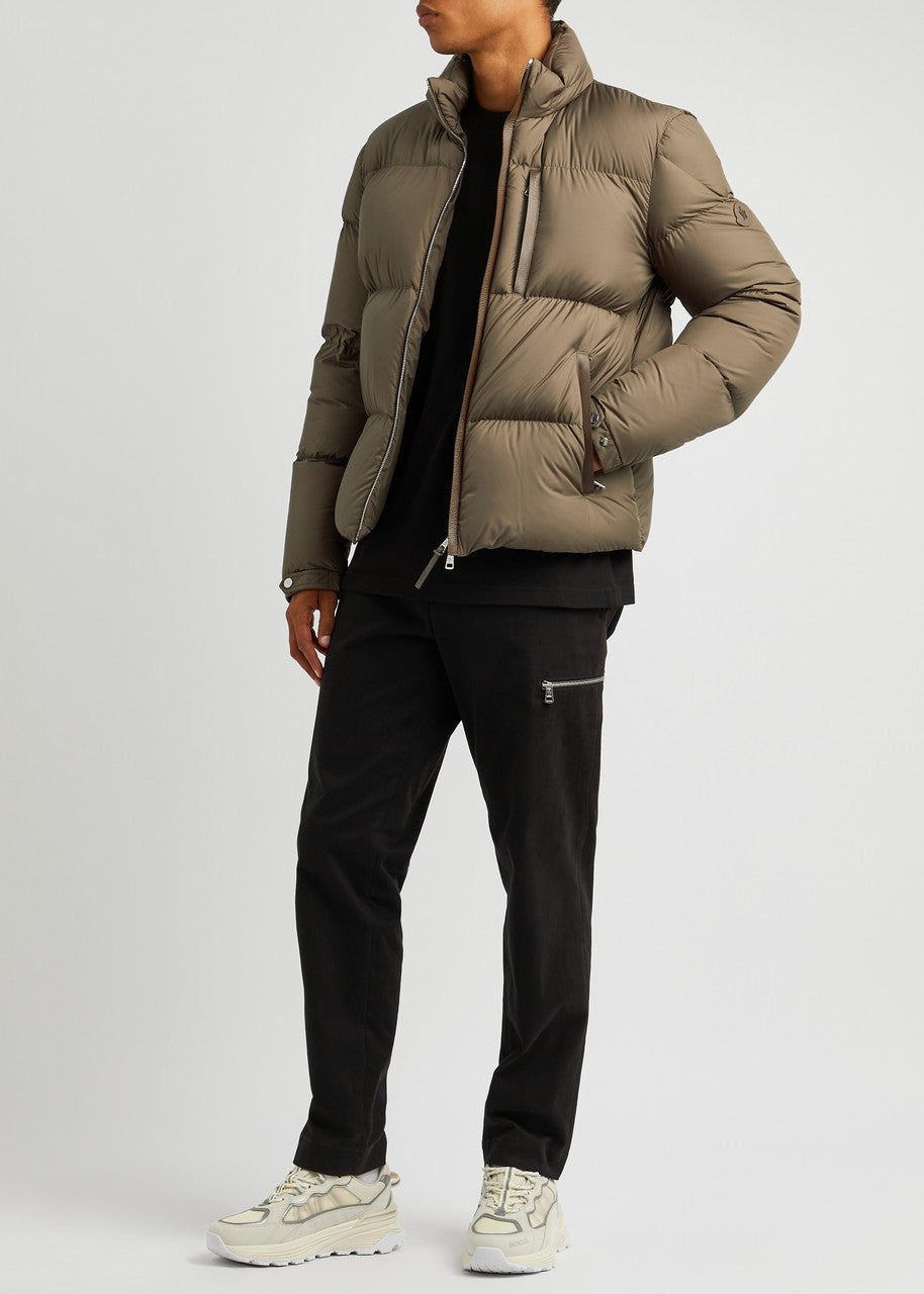 Man wearing a beige puffer jacket,Moncler Men's Besbre Padded Jacket