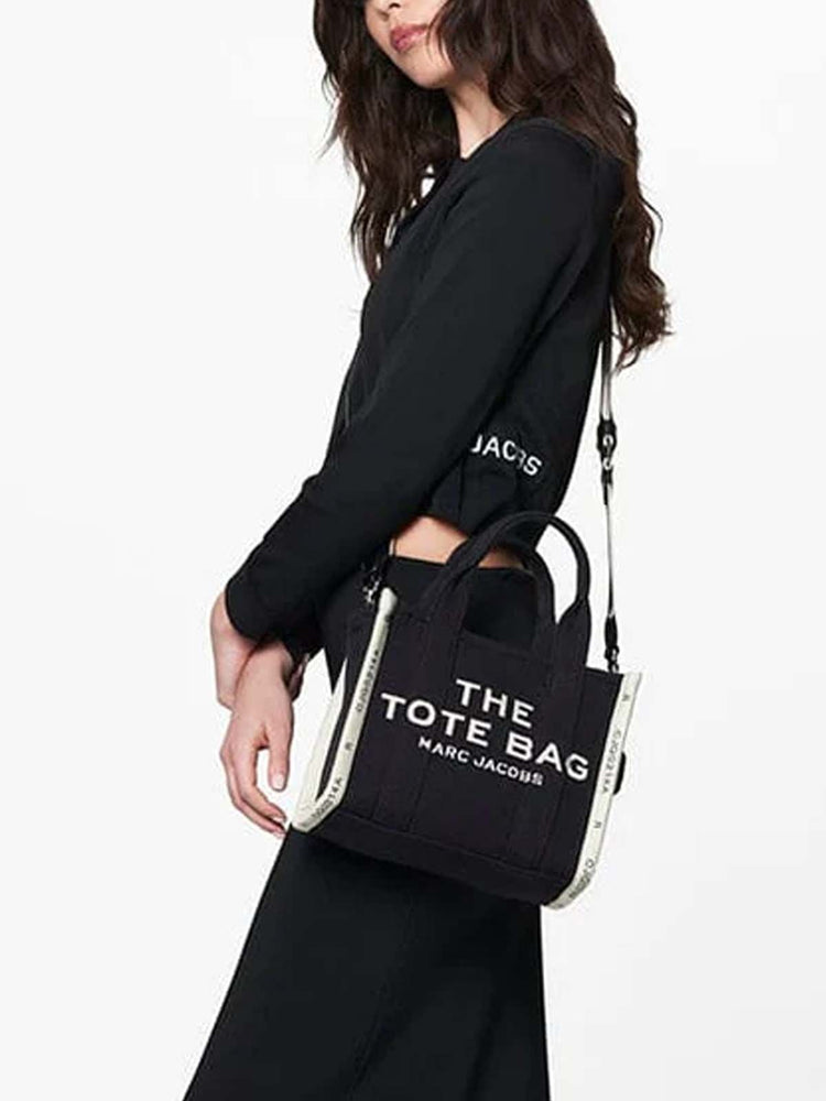 Marc Jacob Canvas Shopper Tote Bag in black with bold white lettering, stylish and practical for everyday use.