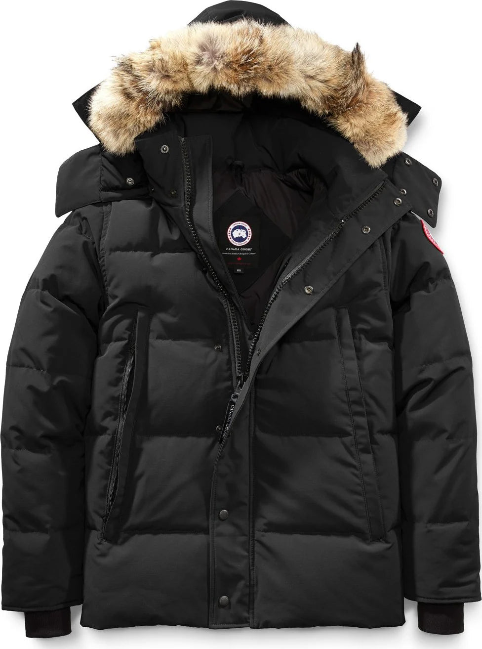 Black winter jacket with fur-lined hood on a white background. Canada Goose Wyndham Parka with Fur jacket