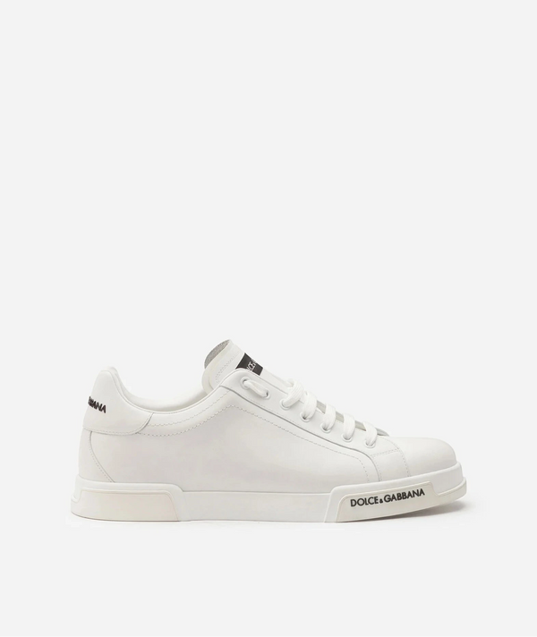 White sneaker with Dolce & Gabbana branding on a white background