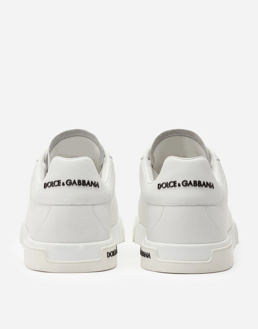 White sneakers with Dolce & Gabbana at Volonka store.
