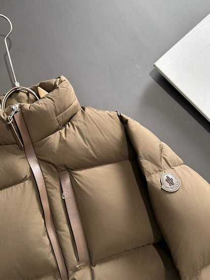 Beige puffer jacket with a brand logo. Moncler Men's Besbre Padded Jacket