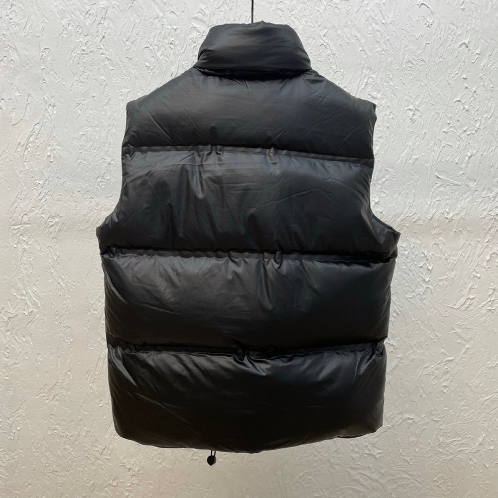Black puffer vest hanging. Prada Men's light Down Vest jacket