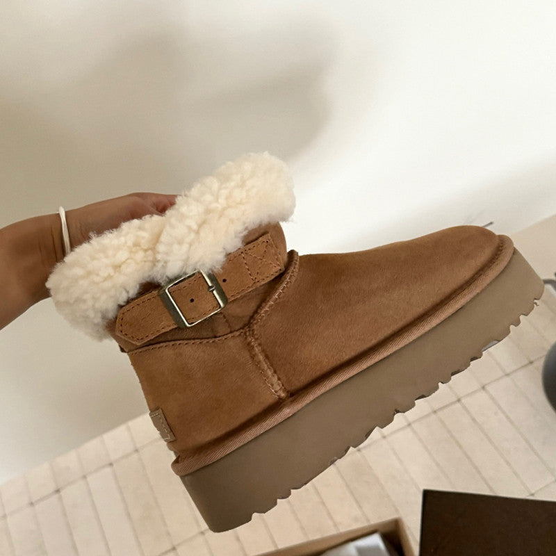 UGG Furry Belted Women's Snow Boot with Thick Platform Sole at Volonka Brown suede boot with white fur lining.