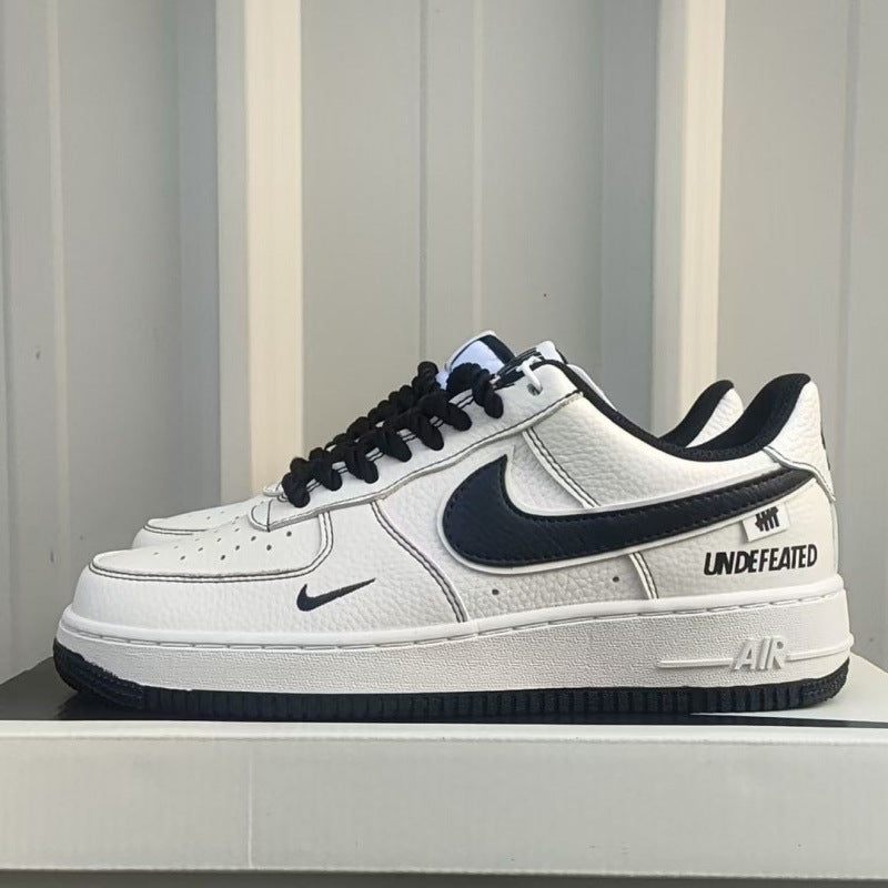 White sneaker with black accents. Nike Unisex F1 Air Force paris Low-top Casual Shoes 