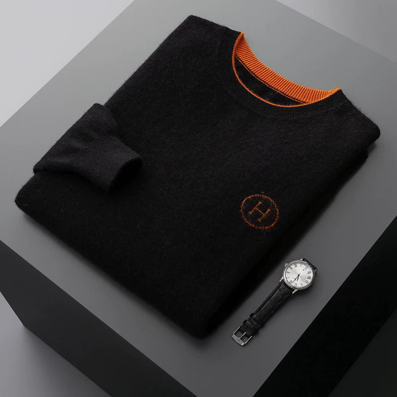 Hermes Men's Cashmere Knitwear Luxury Warm Sweater folded on a table next to a watch