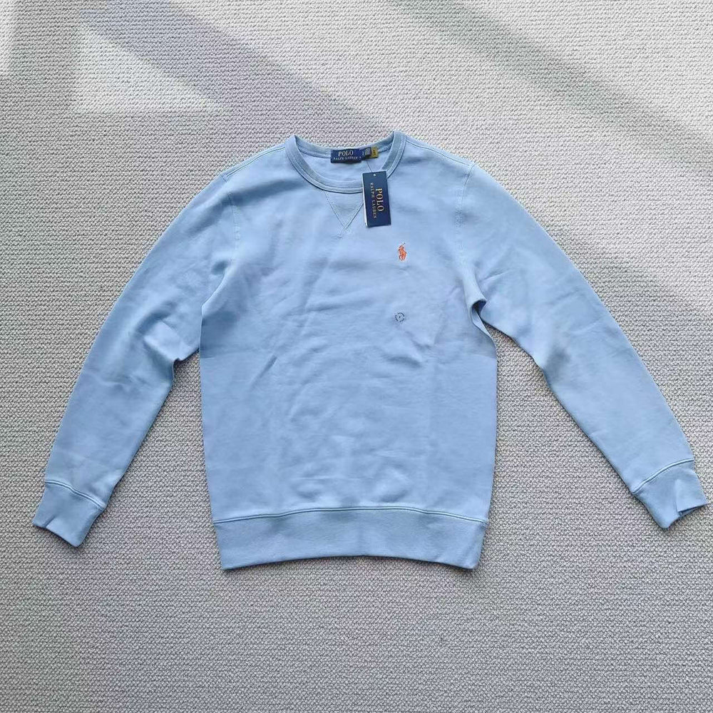 Light blue Polo Ralph Lauren crew neck sweatshirt laid flat on white background