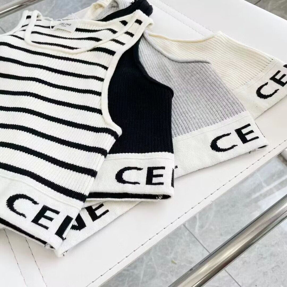 Black and white striped sleeveless top with 'celine' branding in volonka store.