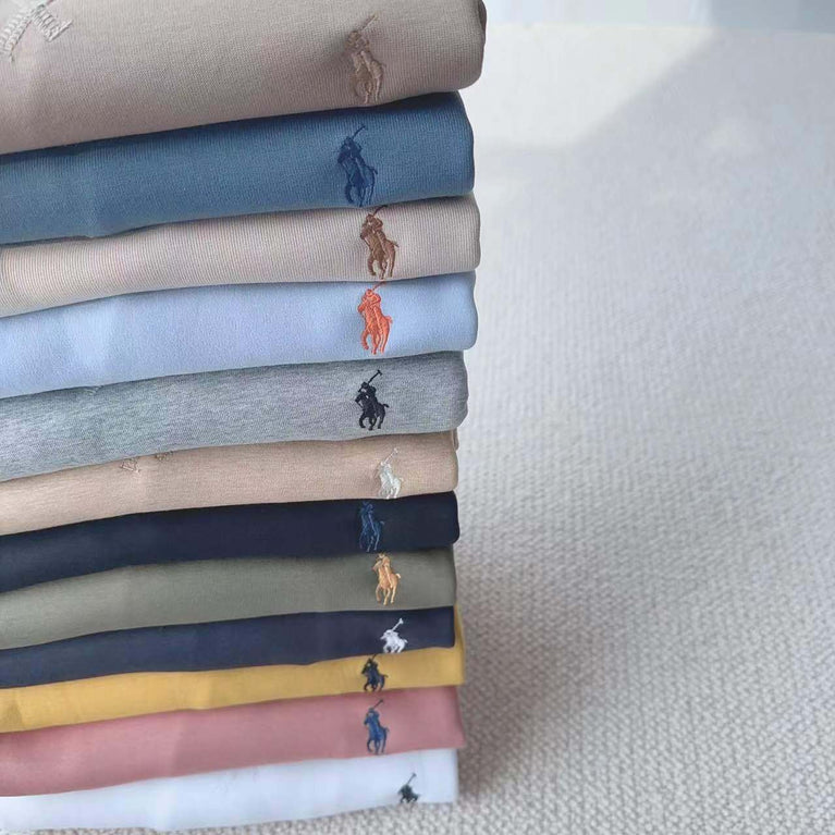 folded Polo Ralph Lauren sweatshirts stacked in various colors