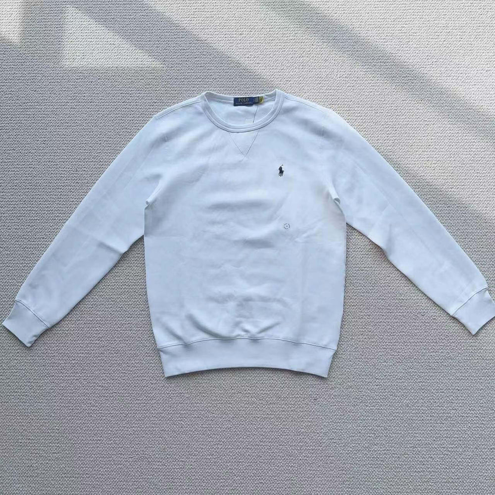 White Polo Ralph Lauren crew neck sweatshirt laid flat on a white surface