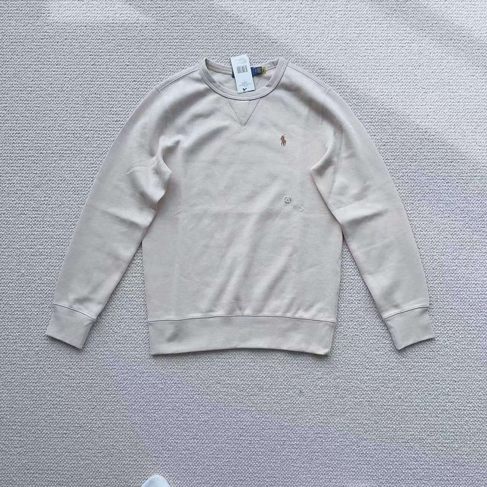 White Polo Ralph Lauren crew neck sweatshirt laid flat on white background