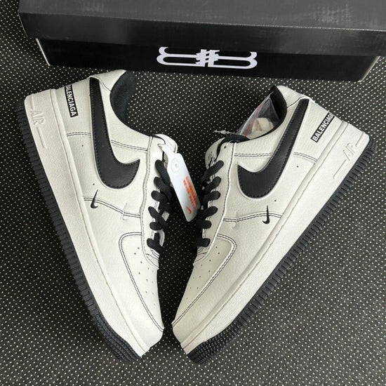 Nike Unisex F1 Air Force paris Low-top Casual Shoes. White sneakers with black swoosh logo on a textured surface