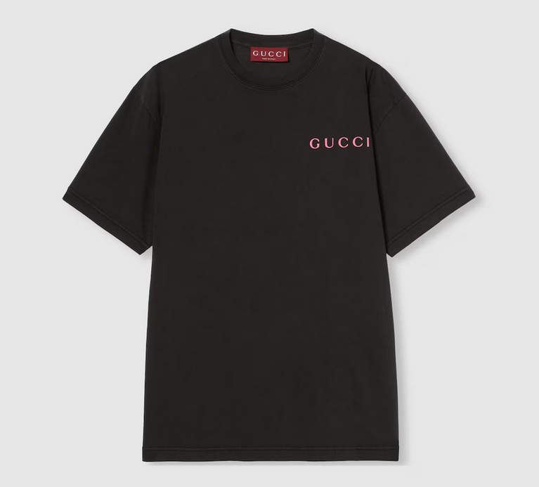 Black Gucci t-shirt with pink logo on a light gray background