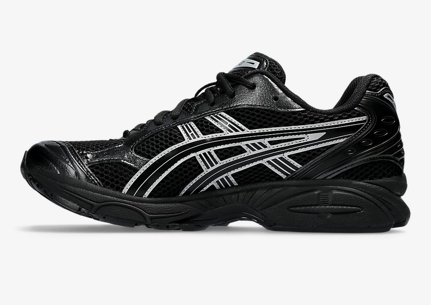 Asics Gel Kayano 14 Unisex Black Pure Silver Sneaker side view showcasing bold design and support.