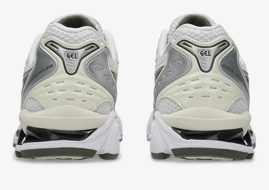 Asics Gel Kayano 14 Unisex White Ivory Sneaker side view, showcasing its retro design and lightweight comfort.