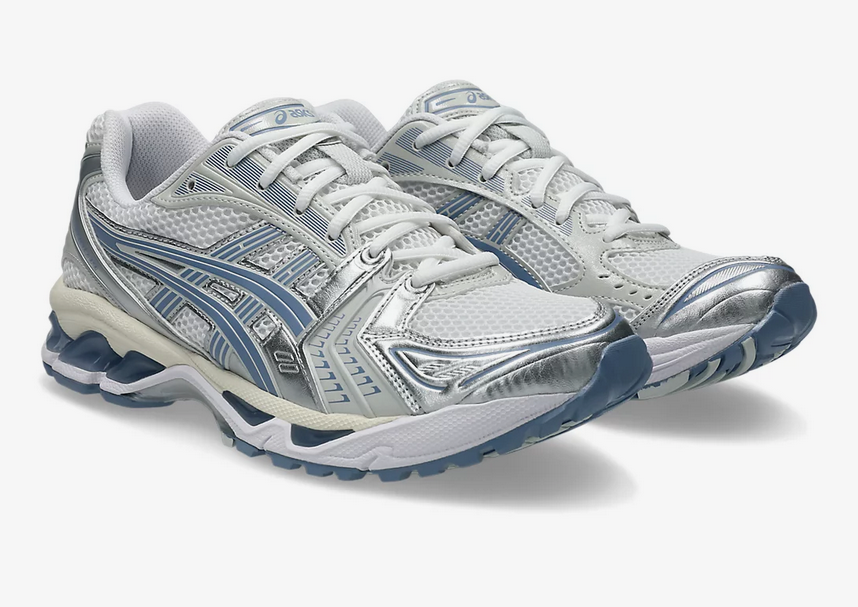 Asics Gel Kayano 14 Unisex White Light Navy Sneaker side view, showcasing retro-inspired design and performance features.