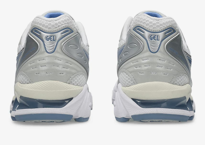 Asics Gel Kayano 14 Unisex White Light Navy Sneaker side view, showcasing retro-inspired design and performance features.