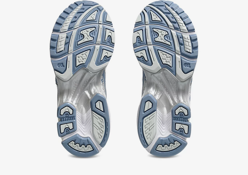 Asics Gel Kayano 14 Unisex White Light Navy Sneaker side view, showcasing retro-inspired design and performance features.