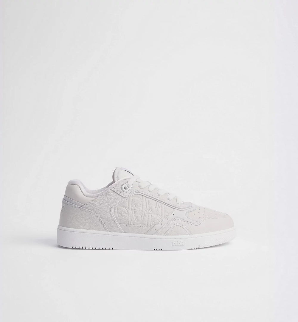 Dior B27 Uptown Low Top Leder Sneaker White side view on a plain background.
