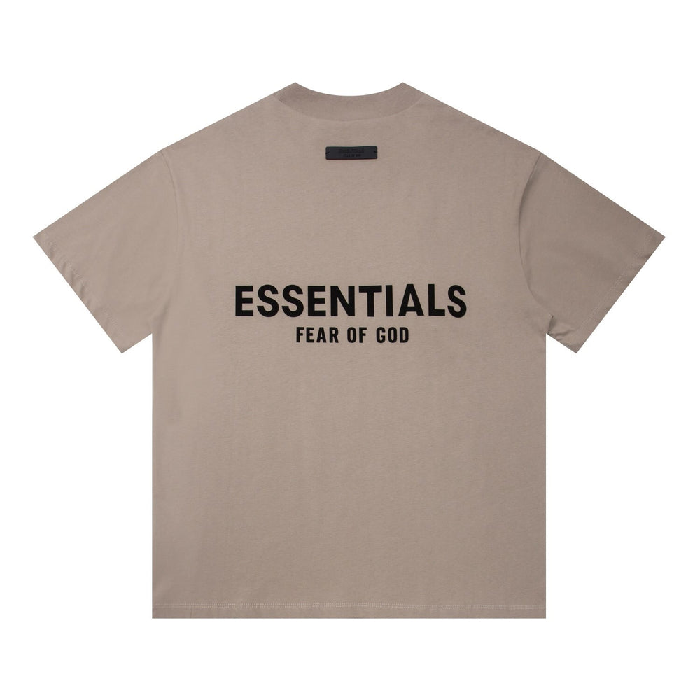 FEAR OF GOD ESSENTIALS Tshirt with Logo showcasing minimalist design and bold typography on the back.