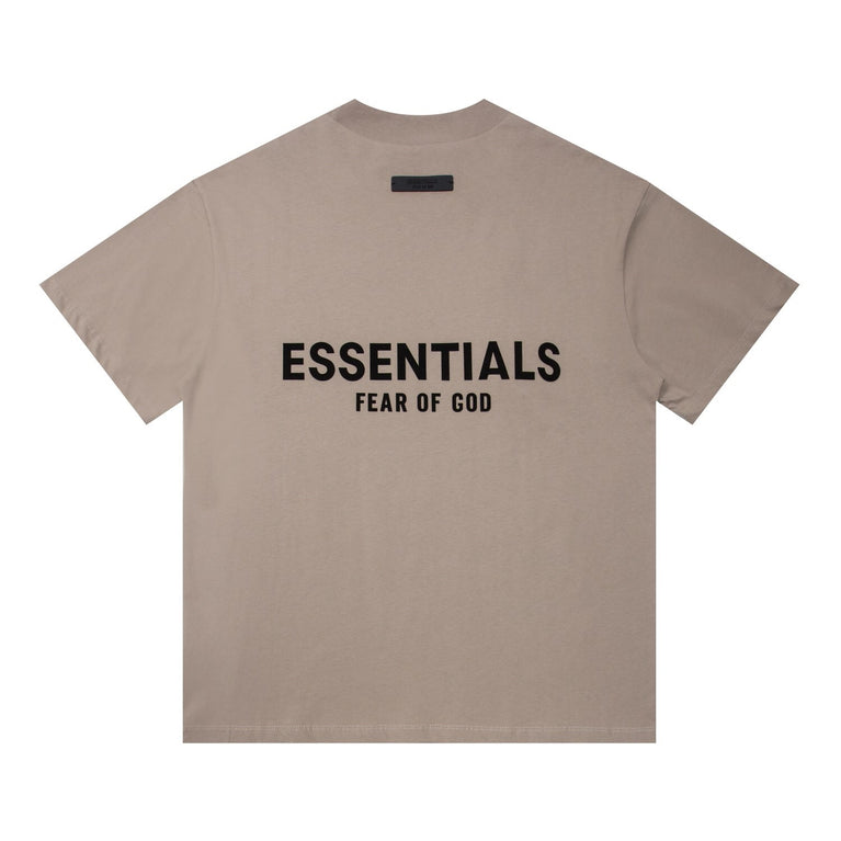 FEAR OF GOD ESSENTIALS Tshirt with Logo showcasing minimalist design and bold typography on the back.