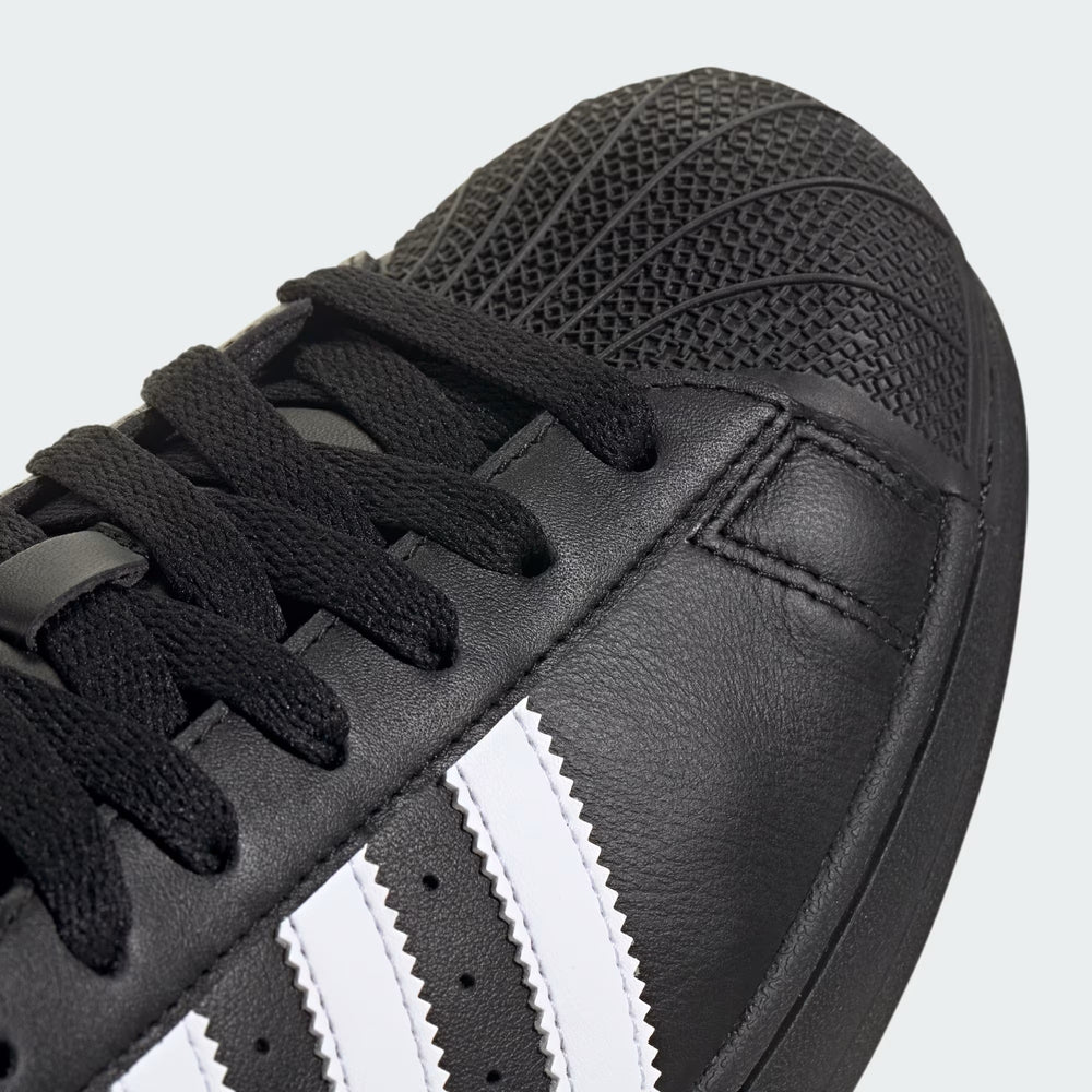 Adidas Superstar II Sneaker Black side view showcasing classic black and white design at Volonka.