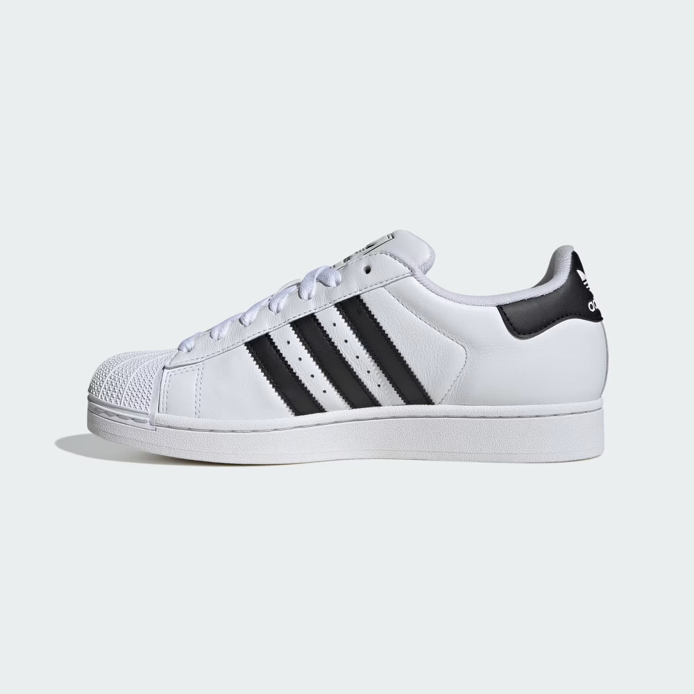 Adidas Superstar II Sneaker white side view with black stripes and rubber shell toe at Volonka.