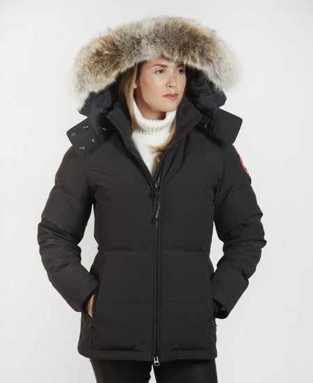 Woman wearing a black coat with a fur, Canada Goose Chelsea Parka Women's Down Winter Jacket