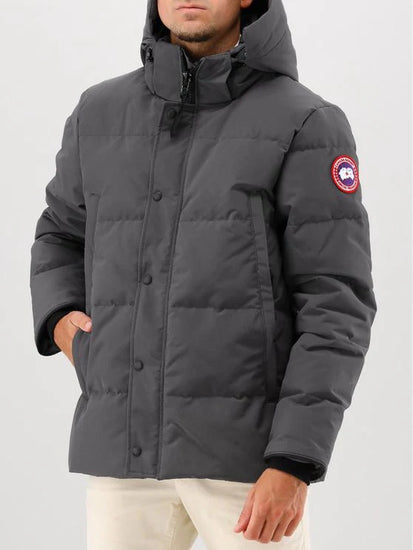 Man wearing a gray Canada Goose jacket, Canada Goose Wyndham Parka Goose Men's Winter Jacket at Volonka. 