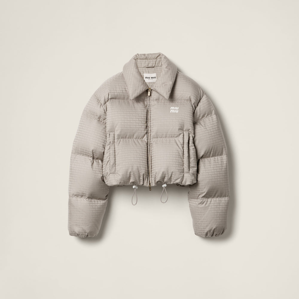 MIUMIU Gray puffer jacket with brand logo on a light gray background
