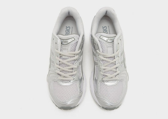 Pair of unisex Asics white running shoes