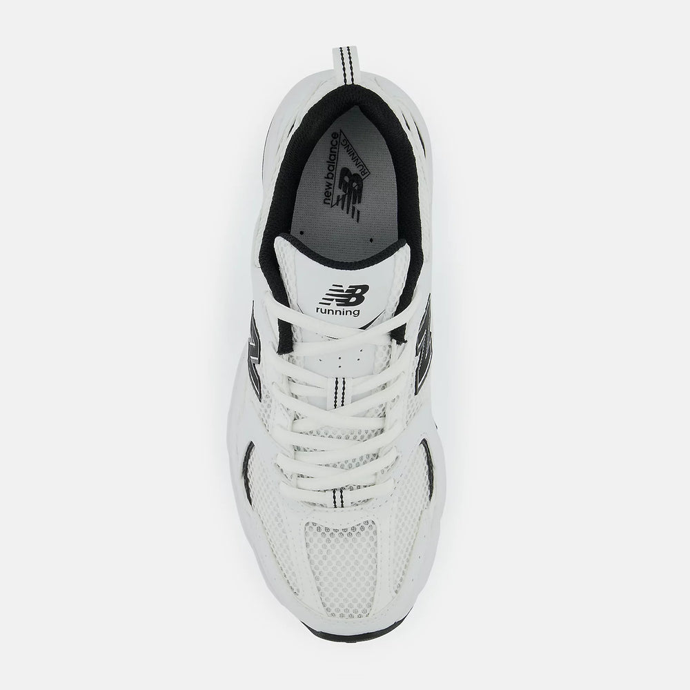 New Balance Men Sneaker 530 White Black side view showcasing its sleek design and breathable mesh at Volonka.