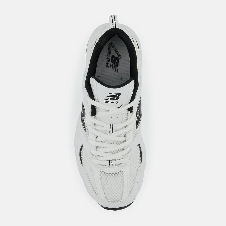New Balance Men Sneaker 530 White Black side view showcasing its sleek design and breathable mesh at Volonka.