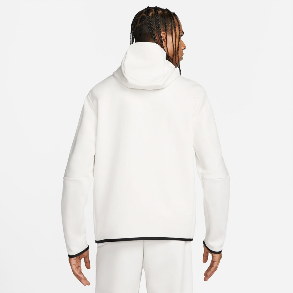 Nike Sportswear Tech Fleece Hoodie & Joggers Set White worn by a model, showcasing modern sportswear style.