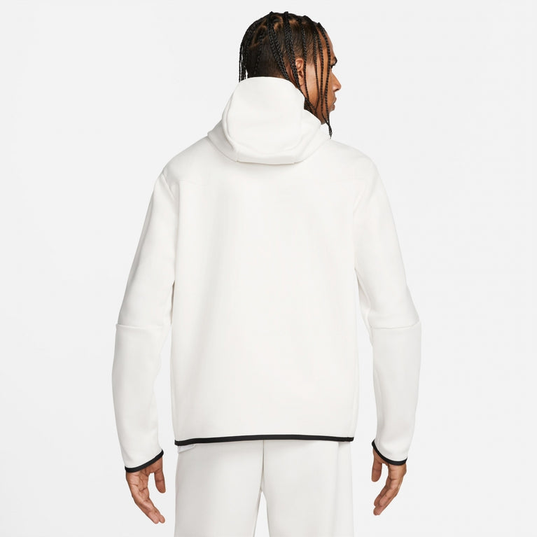 Nike Sportswear Tech Fleece Hoodie & Joggers Set White worn by a model, showcasing modern sportswear style.