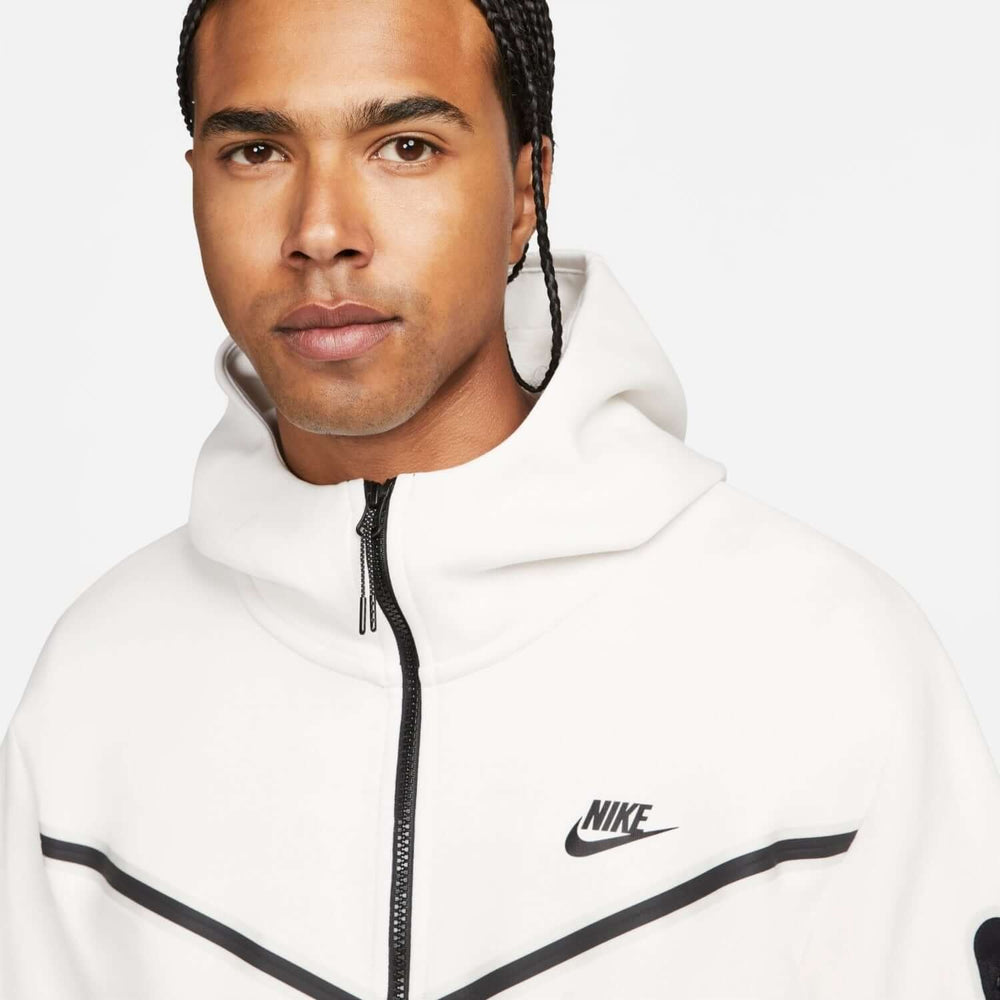 Nike Sportswear Tech Fleece Hoodie & Joggers Set White worn by a model, showcasing modern sportswear style.