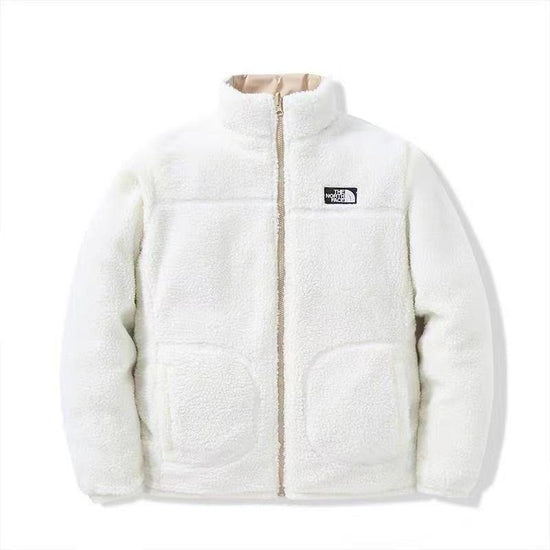 The NorthFace Two Sided Coat for Women and Men. White fleece jacket with a brand logo on a white background